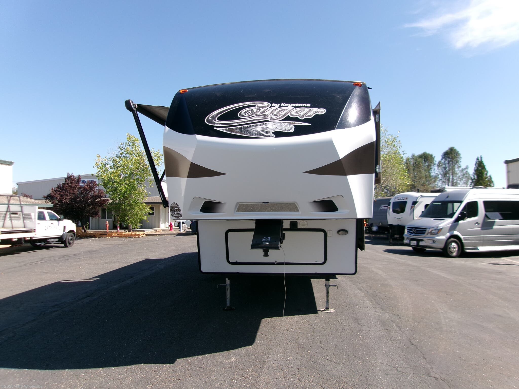 2015 Keystone Cougar 336BHS - Used Fifth Wheel For Sale by AMS Wholesale in Placerville, California features TV, Residential Refrigerator, Slam Latch Baggage Doors, Black Tank Flush, Batteries