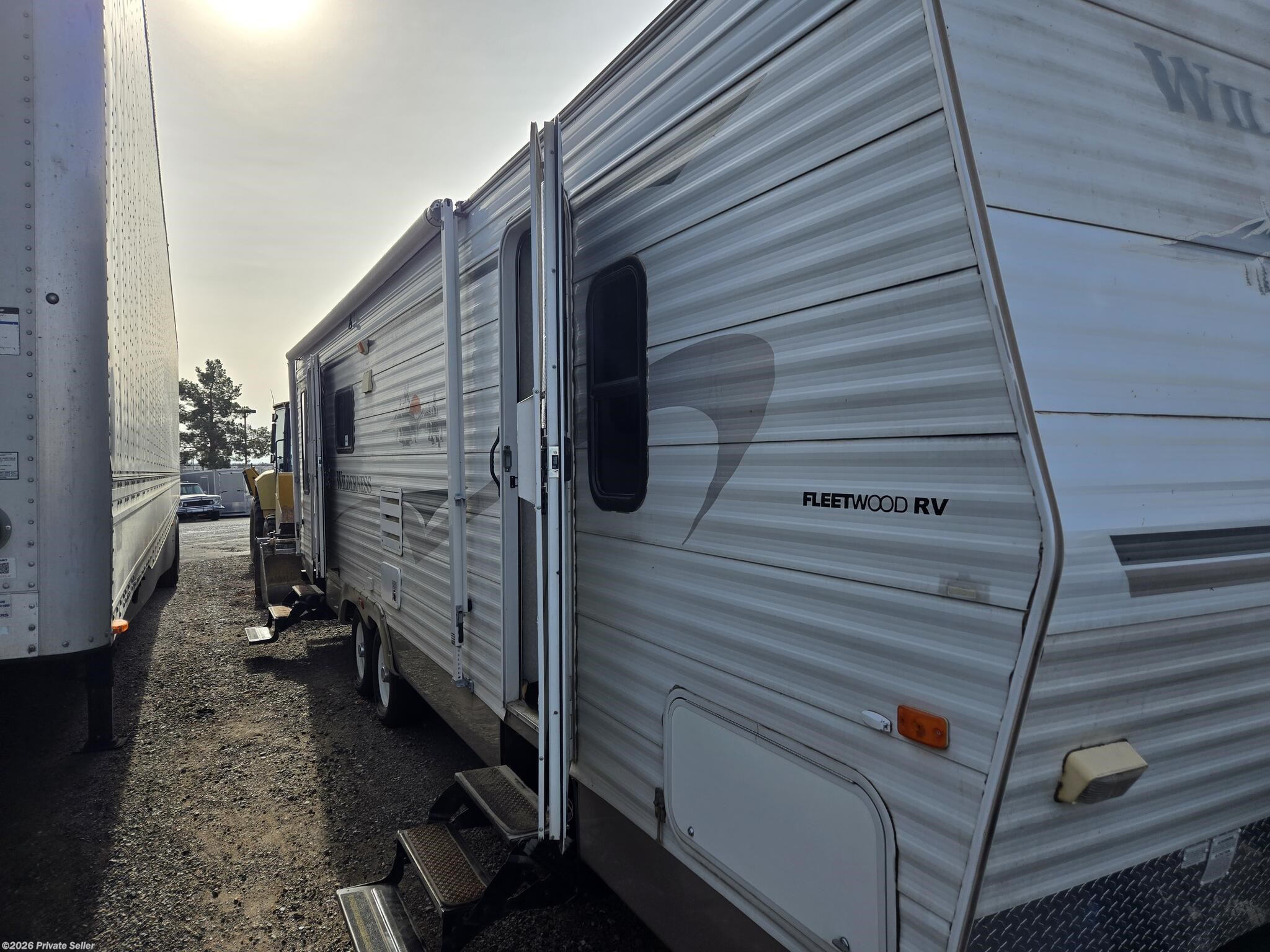 2004 Fleetwood Wilderness "2004 Fleetwood Wilderness 292, 29' with slide-out - Used Travel Trailer For Sale by For Sale By Owner in Avondale, Arizona features Slide-out Battery Tray, Heated Water Tank, Stove Top Burner, Refrigerator, Water Heater