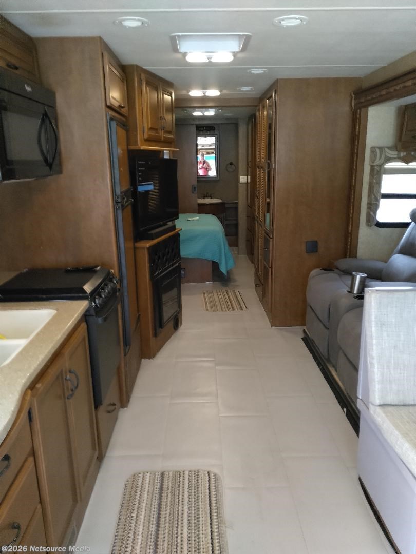 2015 Thor Motor Coach Hurricane 34E - Used Class A For Sale by For Sale By Owner in Summerfield, Florida features Batteries, Stabilizer Jacks, CO Detector, TV, Bath & 1/2