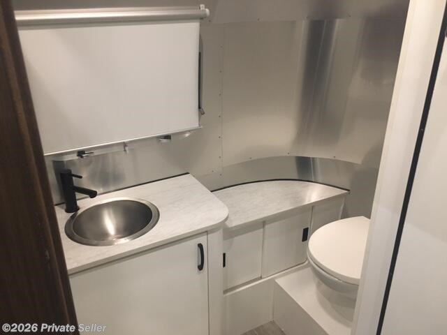 Full width rear privacy bathroom with shower