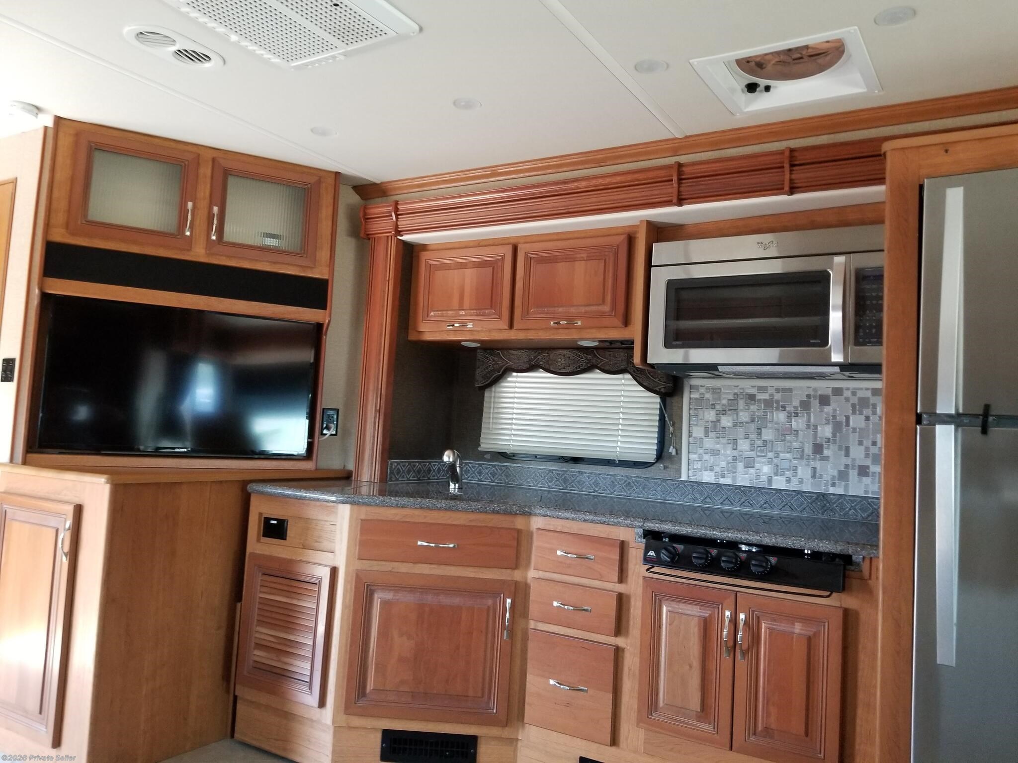 Mid cabin kitchen and Sony TV