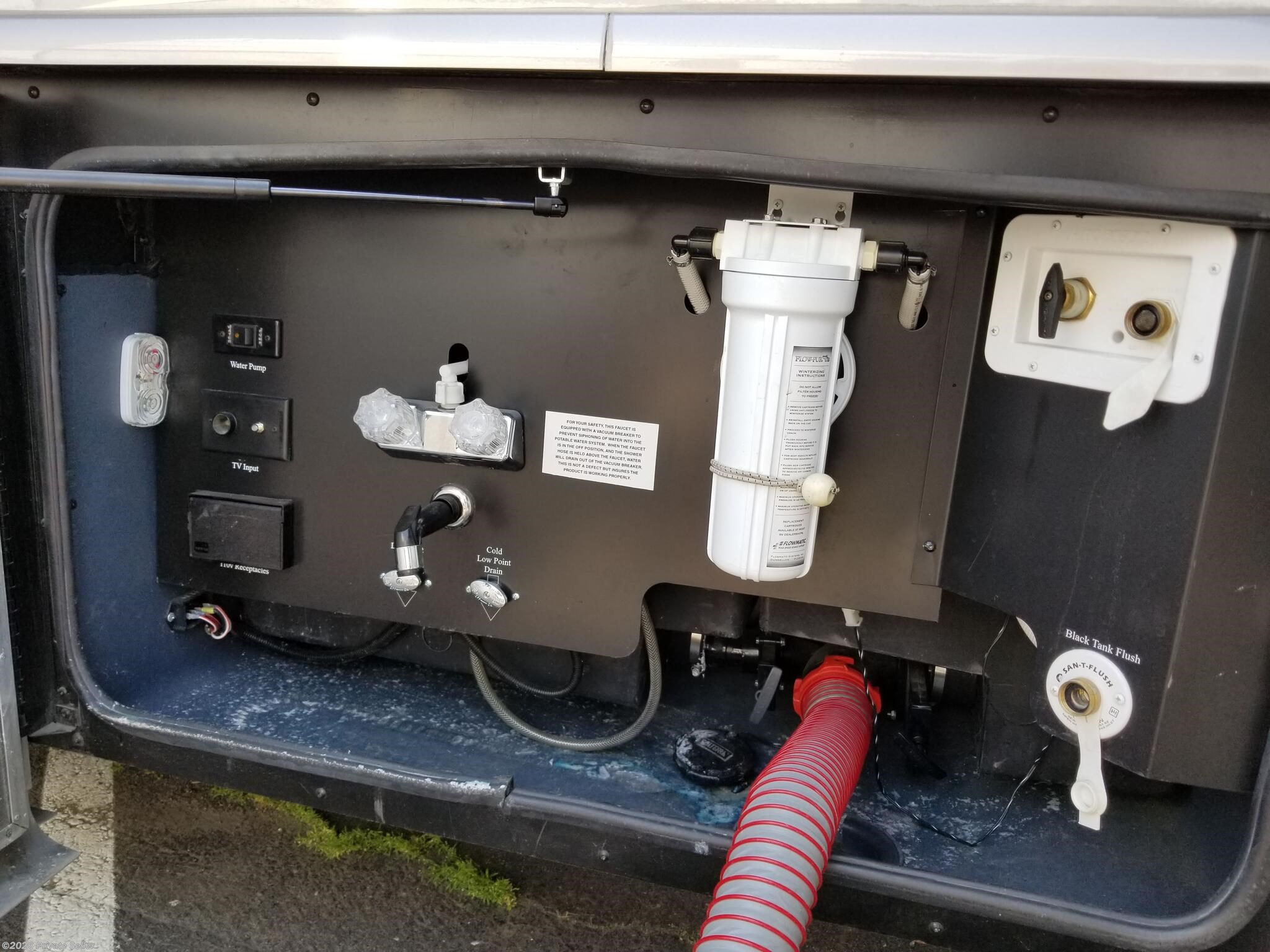 Outside utility compartment and water hookups