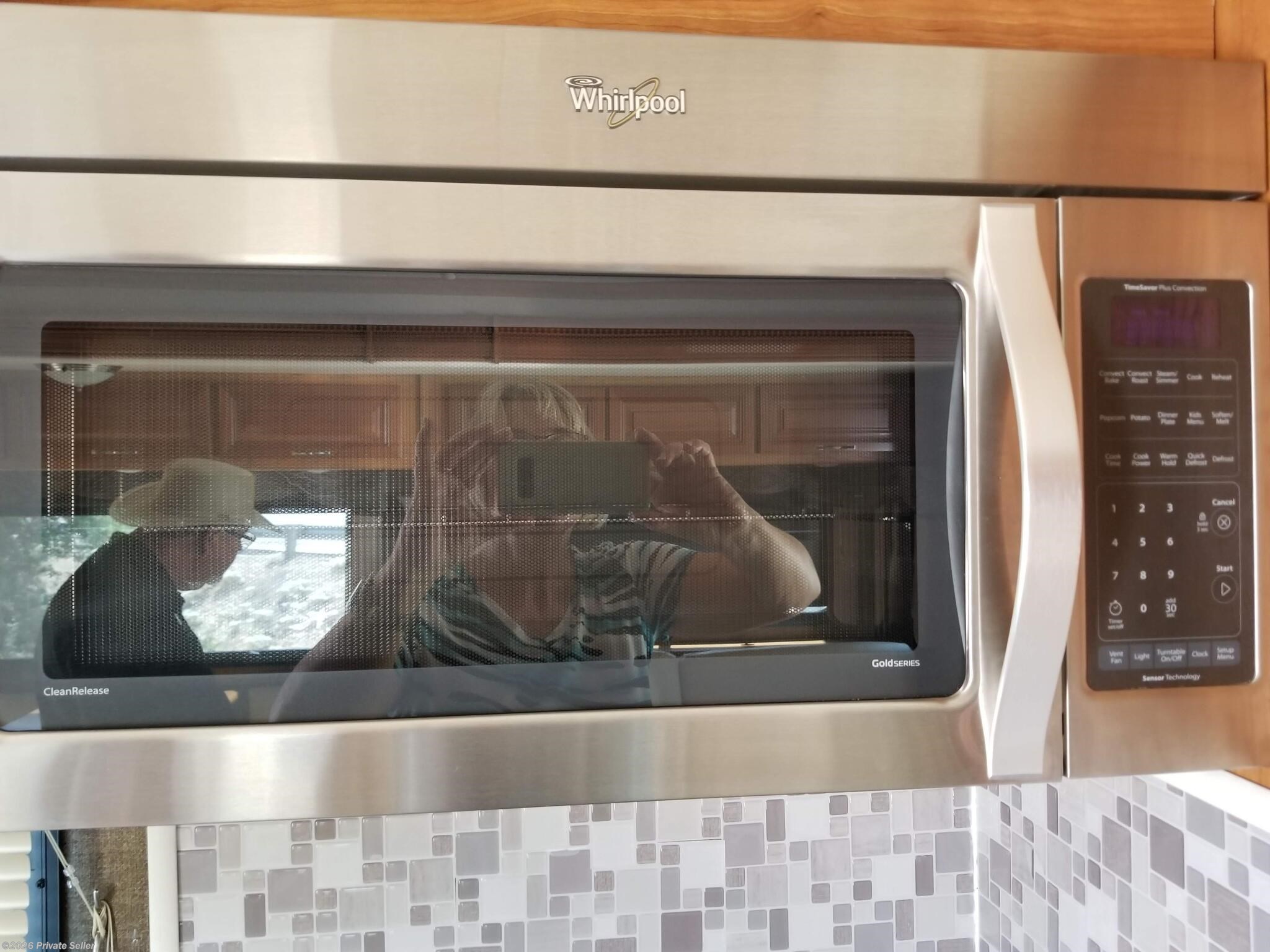 Convection microwave above cooktop