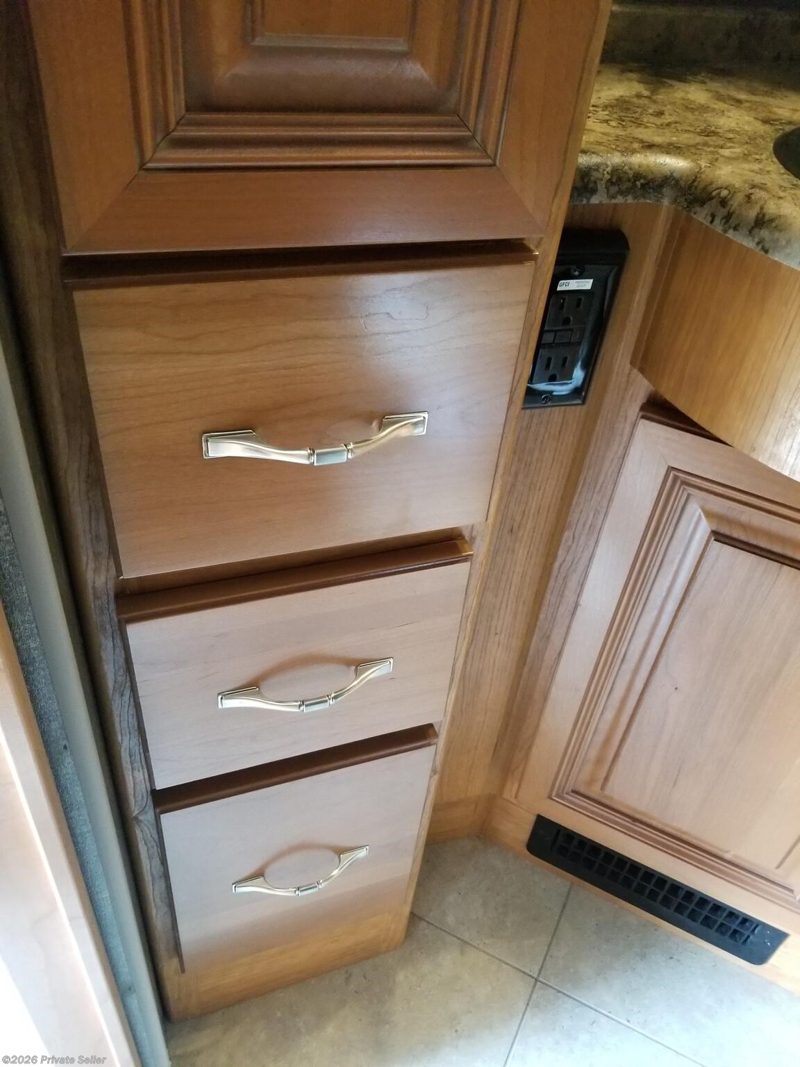 Linen storage to left of sink in half bathroom.