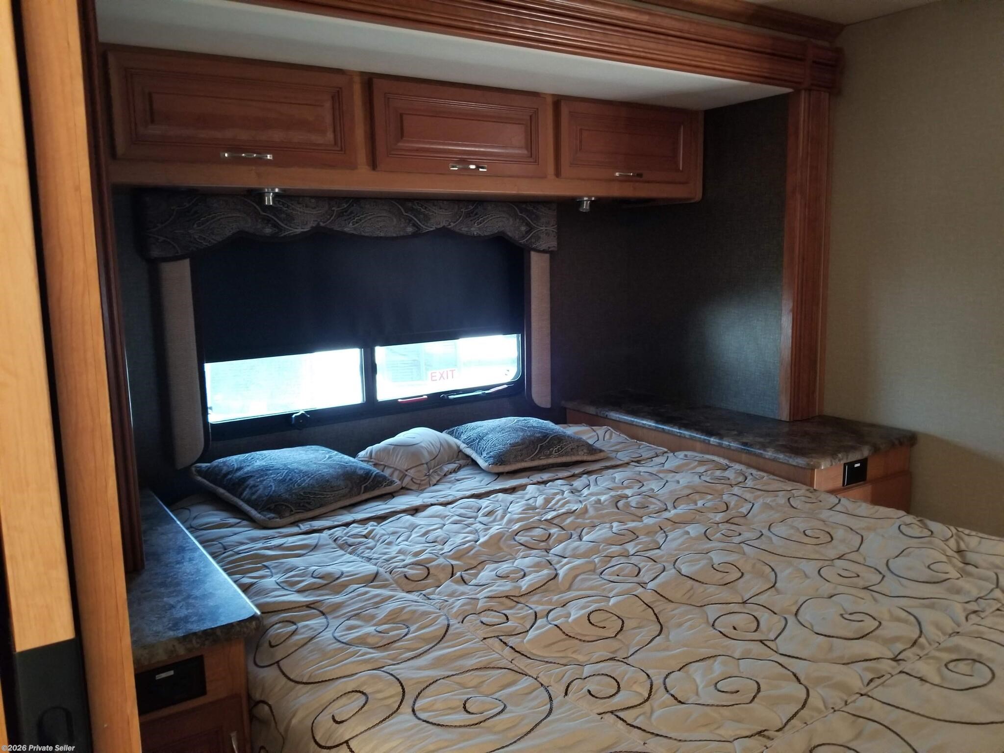 Master queen size bed w/ memory foam mattress. Full length storage above bed.