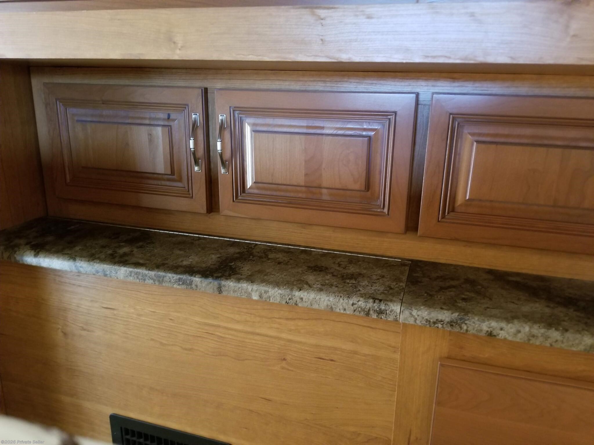 Storage under Master closet--cabinets and bins that open. Stores central vac equipment