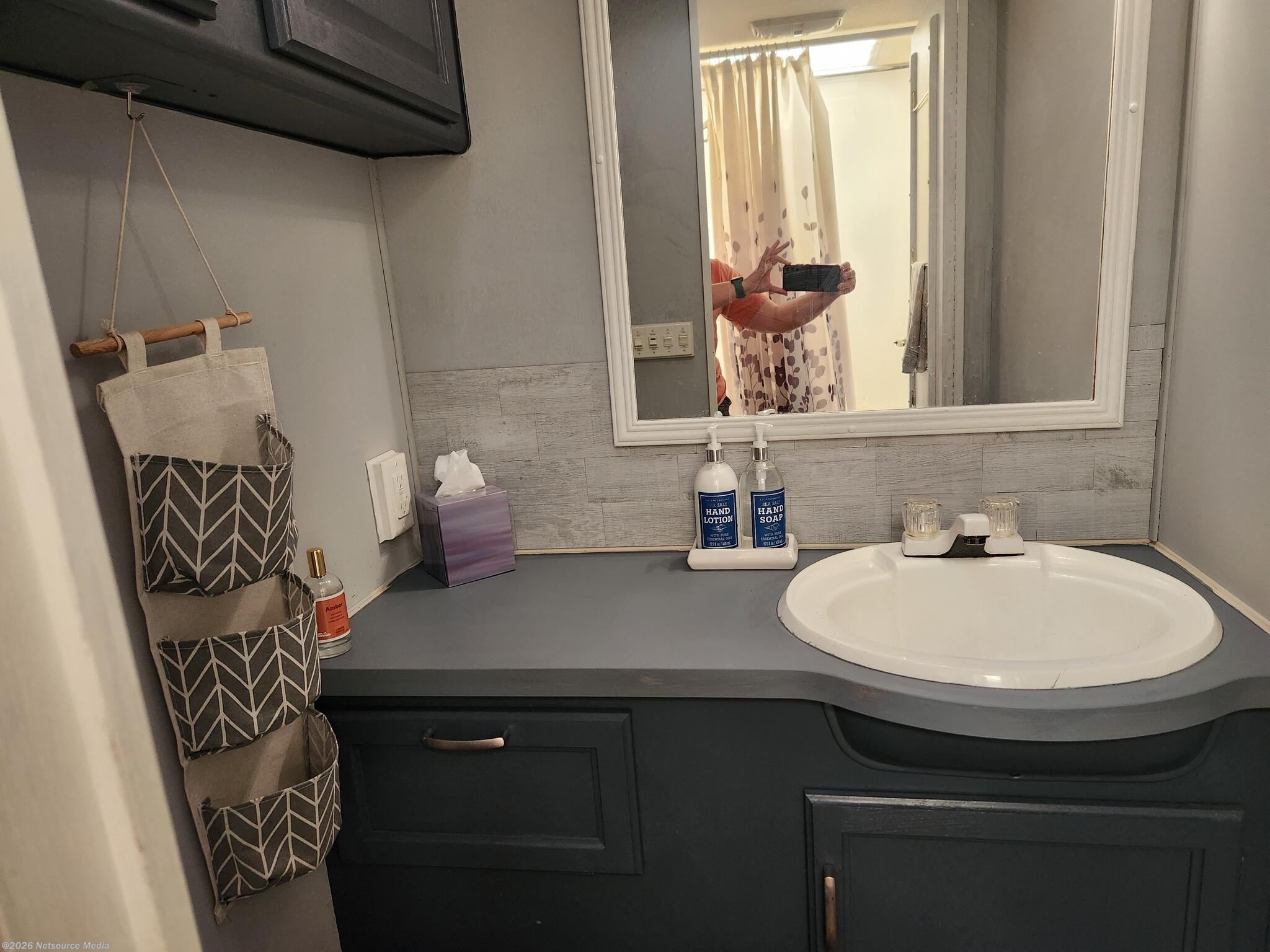 Bathroom, toilet sep from shower across hall