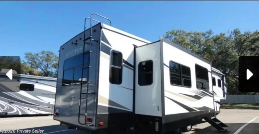 Used 2022 Heartland Bighorn Farmhouse finish, Full size fridge, Rear bedroom available in Dover, Florida
