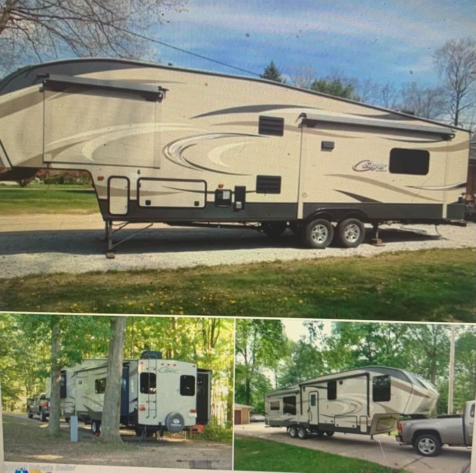 2016 Keystone Cougar 327RES - Used Fifth Wheel For Sale by For Sale By Owner in Macedonia, Ohio features AM/FM/CD, Surround Sound System, Spare Tire Kit, Awning, Roof Vents