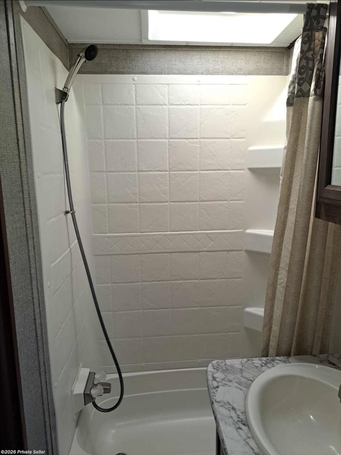 Bathroom with nice shower and bathtub.