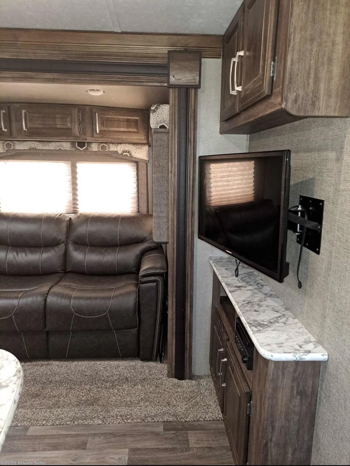 TV in this photo is in bunk room now and was replaced with a 43” smart TV, couch folds into comfortable bed