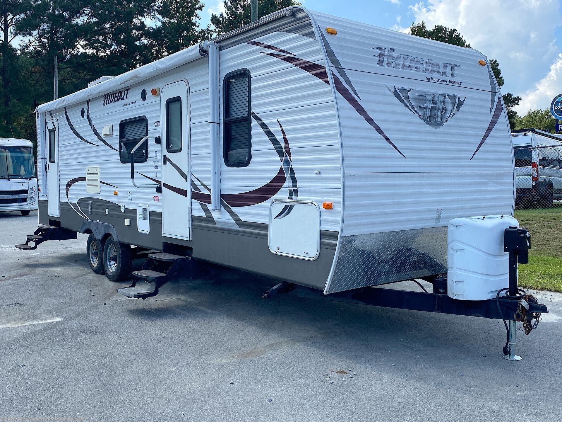 2013 Hornet Hideout 28BHS by Keystone from Blue Compass RV South Raleigh in Benson, North Carolina