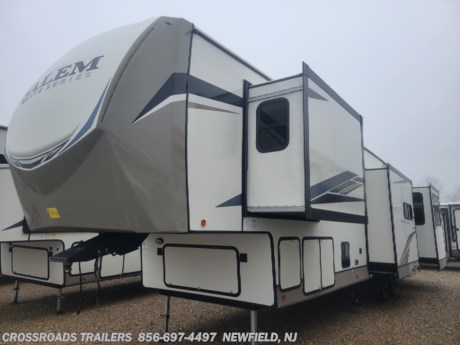 &lt;p&gt;2023 Forest River Salem Hemisphere Elite fifth wheel 35RE highlights:&lt;/p&gt;
&lt;ul&gt;
&lt;li&gt;Quad Slides&lt;/li&gt;
&lt;li&gt;6 Point Electric Auto Level&lt;/li&gt;
&lt;li&gt;20 Cu. Ft. Residential Refrigerator&lt;/li&gt;
&lt;li&gt;Walk-In Shower with Skylight&lt;/li&gt;
&lt;li&gt;King Bed&lt;/li&gt;
&lt;li&gt;2nd 15k AC in Bedroom&lt;/li&gt;
&lt;li&gt;200Watt Mounted Solar Package&lt;/li&gt;
&lt;li&gt;XL Texas Pass-Through Storage&lt;/li&gt;
&lt;li&gt;Two Breakfast Bars with Stools&lt;/li&gt;
&lt;/ul&gt;
&lt;p&gt;&amp;nbsp;Travel in&amp;nbsp;luxury&amp;nbsp;with this Salem Hemisphere Elite fifth wheel in tow!&amp;nbsp;&amp;nbsp;Quad slides&amp;nbsp;create an open feel just like home.&amp;nbsp; The front master bedroom is private and features a&amp;nbsp;king bed&amp;nbsp;slide, a large front wardrobe, and a dresser.&amp;nbsp; A full bath with&amp;nbsp;walk-in shower&amp;nbsp;including an overhead skylight will be a delight over using any campsite facilities.&amp;nbsp; There is also a linen cabinet and porcelain toilet.&amp;nbsp; On the main level, you will find a kitchen sink flanked by&amp;nbsp;two breakfast bars&amp;nbsp;each with two stools for dining.&amp;nbsp; There is a deluxe French door pantry for your snacks and canned goods.&amp;nbsp; The&amp;nbsp;20 cu. ft. residential refrigerator&amp;nbsp;will certainly take care of your perishable items.&amp;nbsp; And the rear area living space features a theater seat slide, a tri-fold sofa, and an entertainment center with 55&quot; TV, plus a fireplace for a cozy night inside.&amp;nbsp; On the outside, you will enjoy the Texas XL sized pass-through storage for all of your outside games and camping gear, a 50&quot; swivel TV, and pull-out gas grill plus refrigerator so you can grill or entertain easily under the two patio awnings.&amp;nbsp;&amp;nbsp;&lt;/p&gt;
&lt;p&gt;From its full-length cathedral ceilings to its Texas-size pass-through storage, you&#39;ll find that the Forest River Salem Hemisphere Elite fifth wheel offers you quite a lot of space! The ducted A/C with quick cool and ceiling paddle fan with light and wall switch will keep the interior at a steady temperature so that you can cool off after an exhausting day outside, and the upgraded insulation package will ensure that the cool air doesn&#39;t escape. There is a rear mounted ladder so that you can get up to the top of your unit easily.&amp;nbsp; You can also easily access the local Wi-Fi source without having to leave your RV because the King Wi-Fi router/range extender will provide you with a powerful connection that you can use to surf the web.&amp;nbsp; For more information on this fifth wheel, email sales@crossroadstrailers.com or call us at 800-545-4497&lt;/p&gt;