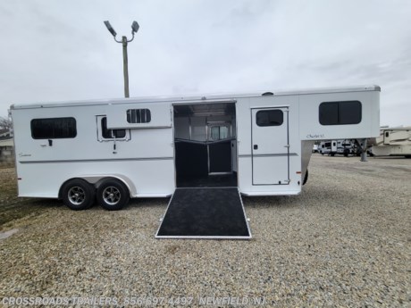 &lt;p&gt;The all new Charter TR SE 2+1 is a 2 horse straight load trailer with a large tack &lt;br /&gt;storage room and tons of extra features. This unit is big and roomy and will be perfect for warmbloods.&amp;nbsp; This trailer is designed with a large side ramp and extra room for an additional horse. The Charter 2+1 also has large sliding windows in the back two stalls, 2 drop down feed doors, and windows in the rear tail curtains. This unit also has a 60&quot; side ramp and 2 stud doors to make this into a box stalls. The Charter TR SE 2+1 is built with the same quality and standards that people have come to expect from a Sundowner. It carries a 3 year hitch to &lt;br /&gt;bumper and 8 year structural warranty.&lt;br /&gt;STANDARD FEATURES&lt;br /&gt;- 2 5/16&amp;rdquo; Gooseneck hitch, &lt;br /&gt;&amp;nbsp;adjustable&lt;br /&gt;- 2 Horse&lt;br /&gt;- Straight load&lt;br /&gt;- 6&amp;rsquo;9&amp;rdquo; Wide&lt;br /&gt;- 7&amp;rsquo;6&amp;rdquo; Tall&lt;br /&gt;- 38&amp;rdquo; Wide stalls&lt;br /&gt;- All aluminum construction&lt;br /&gt;- All aluminum floor&lt;br /&gt;- Pre-painted aluminum &lt;br /&gt;&amp;nbsp;exterior (white)&lt;br /&gt;- Rubber torsion axles&lt;br /&gt;- 4 Wheel electric brakes &lt;br /&gt;&amp;nbsp;with safety breakaway&lt;br /&gt;- LED clearance &amp;amp; tail lights&lt;br /&gt;- Drop leg jack&lt;br /&gt;- Graphics package&lt;br /&gt;- Spare tire and wheel with &lt;br /&gt;&amp;nbsp;trim ring&lt;br /&gt;- Full length running boards&lt;br /&gt;HORSE AREA&lt;br /&gt;- Padded solid head and shoulder &lt;br /&gt;&amp;nbsp;divider with butt bar and breast &lt;br /&gt;&amp;nbsp;bar per stall&lt;br /&gt;- Floor mats in horse area&lt;br /&gt;- Large sliding window per stall&lt;br /&gt;- 2 Sliding windows in the tail &lt;br /&gt;&amp;nbsp;curtains&lt;br /&gt;FRONT TACK STORAGE&lt;br /&gt;- Locking tack door with window&lt;br /&gt;- Rubber floor mats&lt;br /&gt;- Dome light &lt;br /&gt;- 6 Tack hooks&lt;br /&gt;- Blanket bar&lt;br /&gt;- Brush tray&lt;br /&gt;- 19&amp;rdquo; x 53&amp;rdquo; Windows in the nose&lt;br /&gt;- 2 Saddle racks&lt;br /&gt;- Access door from tack room to horse area&lt;br /&gt;- Face guards&lt;br /&gt;- Drop down feed door with &lt;br /&gt;&amp;nbsp;aluminum guard per stall&lt;br /&gt;- SunCoated&amp;trade; side walls &lt;br /&gt;&amp;nbsp;(double wall construction)&lt;br /&gt;- Spring loaded rear ramp &lt;br /&gt;&amp;nbsp;(rubber lined) with wrap around&lt;br /&gt;&amp;nbsp;tail curtains above rear ramp&lt;br /&gt;- 2 Pop-up vents&lt;br /&gt;- Dome light in horse area&lt;br /&gt;- 3 Outside and 5 inside tie rings&lt;/p&gt;
&lt;p&gt;60&amp;rdquo; Side ramp with curtain&amp;nbsp; &amp;nbsp; &amp;nbsp; &amp;nbsp; &amp;nbsp; &amp;nbsp; &amp;nbsp; &amp;nbsp; &amp;nbsp; &amp;nbsp; &amp;nbsp; &amp;nbsp; &amp;nbsp; &amp;nbsp; &amp;nbsp; &amp;nbsp; &amp;nbsp; &amp;nbsp; &amp;nbsp; &amp;nbsp; &amp;nbsp; &amp;nbsp; &amp;nbsp; &amp;nbsp; &amp;nbsp; &amp;nbsp; &amp;nbsp; &amp;nbsp; &amp;nbsp; &amp;nbsp; &amp;nbsp; &amp;nbsp; &amp;nbsp; &amp;nbsp; &amp;nbsp; &amp;nbsp; &amp;nbsp; &amp;nbsp; &amp;nbsp; &amp;nbsp; &amp;nbsp; &amp;nbsp; &amp;nbsp; &amp;nbsp; &amp;nbsp; &amp;nbsp; &amp;nbsp; &amp;nbsp; &amp;nbsp; &amp;nbsp; &amp;nbsp; &amp;nbsp; &amp;nbsp; &amp;nbsp; &amp;nbsp; &amp;nbsp; - Full height stud door per stall&amp;nbsp;&amp;nbsp;&amp;nbsp;&amp;nbsp;&amp;nbsp;&amp;nbsp;&amp;nbsp;&amp;nbsp;&amp;nbsp;&amp;nbsp;&amp;nbsp;&amp;nbsp;&amp;nbsp;&amp;nbsp;&amp;nbsp;&amp;nbsp;&amp;nbsp;&amp;nbsp;&amp;nbsp;&amp;nbsp;&amp;nbsp;&amp;nbsp;&amp;nbsp;&amp;nbsp;&amp;nbsp;&amp;nbsp;&amp;nbsp;&amp;nbsp;&amp;nbsp;&amp;nbsp;&amp;nbsp;&amp;nbsp;&amp;nbsp;&amp;nbsp;&amp;nbsp;&amp;nbsp;&amp;nbsp;&amp;nbsp;&amp;nbsp;&amp;nbsp;&amp;nbsp;&amp;nbsp;&amp;nbsp;&amp;nbsp;&amp;nbsp;&amp;nbsp;&amp;nbsp;&amp;nbsp;&amp;nbsp;&amp;nbsp;&amp;nbsp;&amp;nbsp;&amp;nbsp;&amp;nbsp;&amp;nbsp;&amp;nbsp;&amp;nbsp;&amp;nbsp;&amp;nbsp;&amp;nbsp;&amp;nbsp;&amp;nbsp;&amp;nbsp;&amp;nbsp;&amp;nbsp;&amp;nbsp;&amp;nbsp;&amp;nbsp;&amp;nbsp;&amp;nbsp;&amp;nbsp;&amp;nbsp;&amp;nbsp;&amp;nbsp;&amp;nbsp;&amp;nbsp;&amp;nbsp;&amp;nbsp;&amp;nbsp;&amp;nbsp;&amp;nbsp;&amp;nbsp;&amp;nbsp;&amp;nbsp;&amp;nbsp;&amp;nbsp;&lt;/p&gt;
&lt;p style=&quot;text-align: left;&quot;&gt;- Full height side access door&lt;/p&gt;
&lt;p style=&quot;text-align: left;&quot;&gt;For more information on this great horse trailer, contact sales@crossroadstrailers.com or call us at 800-545-4497&amp;nbsp; &amp;nbsp; &amp;nbsp; &amp;nbsp; &amp;nbsp; &amp;nbsp; &amp;nbsp; &amp;nbsp; &amp;nbsp; &amp;nbsp; &amp;nbsp; &amp;nbsp; &amp;nbsp; &amp;nbsp; &amp;nbsp; &amp;nbsp; &amp;nbsp; &amp;nbsp; &amp;nbsp; &amp;nbsp; &amp;nbsp; &amp;nbsp; &amp;nbsp; &amp;nbsp; &amp;nbsp; &amp;nbsp; &amp;nbsp; &amp;nbsp; &amp;nbsp; &amp;nbsp; &amp;nbsp; &amp;nbsp; &amp;nbsp; &amp;nbsp; &amp;nbsp; &amp;nbsp; &amp;nbsp; &amp;nbsp; &amp;nbsp; &amp;nbsp; &amp;nbsp; &amp;nbsp; &amp;nbsp; &amp;nbsp; &amp;nbsp; &amp;nbsp; &amp;nbsp; &amp;nbsp; &amp;nbsp; &amp;nbsp; &amp;nbsp; &amp;nbsp; &amp;nbsp; &amp;nbsp; &amp;nbsp; &amp;nbsp; &amp;nbsp; &amp;nbsp; &amp;nbsp; &amp;nbsp; &amp;nbsp; &amp;nbsp; &amp;nbsp; &amp;nbsp; &amp;nbsp; &amp;nbsp; &amp;nbsp; &amp;nbsp; &amp;nbsp; &amp;nbsp; &amp;nbsp; &amp;nbsp; &amp;nbsp; &amp;nbsp; &amp;nbsp; &amp;nbsp; &amp;nbsp; &amp;nbsp; &amp;nbsp; &amp;nbsp; &amp;nbsp; &amp;nbsp; &amp;nbsp; &amp;nbsp; &amp;nbsp; &amp;nbsp; &amp;nbsp; &amp;nbsp; &amp;nbsp; &amp;nbsp; &amp;nbsp; &amp;nbsp; &amp;nbsp; &amp;nbsp; &amp;nbsp; &amp;nbsp; &amp;nbsp; &amp;nbsp; &amp;nbsp; &amp;nbsp; &amp;nbsp; &amp;nbsp; &amp;nbsp; &amp;nbsp; &amp;nbsp; &amp;nbsp; &amp;nbsp; &amp;nbsp; &amp;nbsp; &amp;nbsp; &amp;nbsp; &amp;nbsp; &amp;nbsp; &amp;nbsp; &amp;nbsp; &amp;nbsp; &amp;nbsp; &amp;nbsp; &amp;nbsp; &amp;nbsp; &amp;nbsp; &amp;nbsp; &amp;nbsp; &amp;nbsp; &amp;nbsp; &amp;nbsp; &amp;nbsp; &amp;nbsp; &amp;nbsp; &amp;nbsp; &amp;nbsp; &amp;nbsp; &amp;nbsp; &amp;nbsp; &amp;nbsp; &amp;nbsp; &amp;nbsp; &amp;nbsp; &amp;nbsp; &amp;nbsp; &amp;nbsp; &amp;nbsp; &amp;nbsp; &amp;nbsp; &amp;nbsp; &amp;nbsp; &amp;nbsp; &amp;nbsp; &amp;nbsp;&lt;/p&gt;