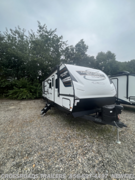&lt;p style=&quot;text-align: center;&quot;&gt;This Northern Spirit by Coachman is packed with everything you would need to take your camping experience to the next level. Whether your a beginner camper or experienced this trailer will the the perfect fit fo you. With a queen sized bed, bunk beds, and sofa this trailer sleeps up to 10 people so there is enough room to bring all your family and friends so you can enjoy your next adventure with the ones you love. This trailer also comes with&amp;nbsp;a beautiful bathroom and spacious shower as well as featuring a stunning kitchen and outdoor kitchen so the fun doesn&#39;t just stop inside. The features are not just limited to those as this trailer is loaded so so many attributes. For more information on this amazing trailer give us a call at 856-697-4497 or email us at sales@crossroadstrailers.com&lt;/p&gt;