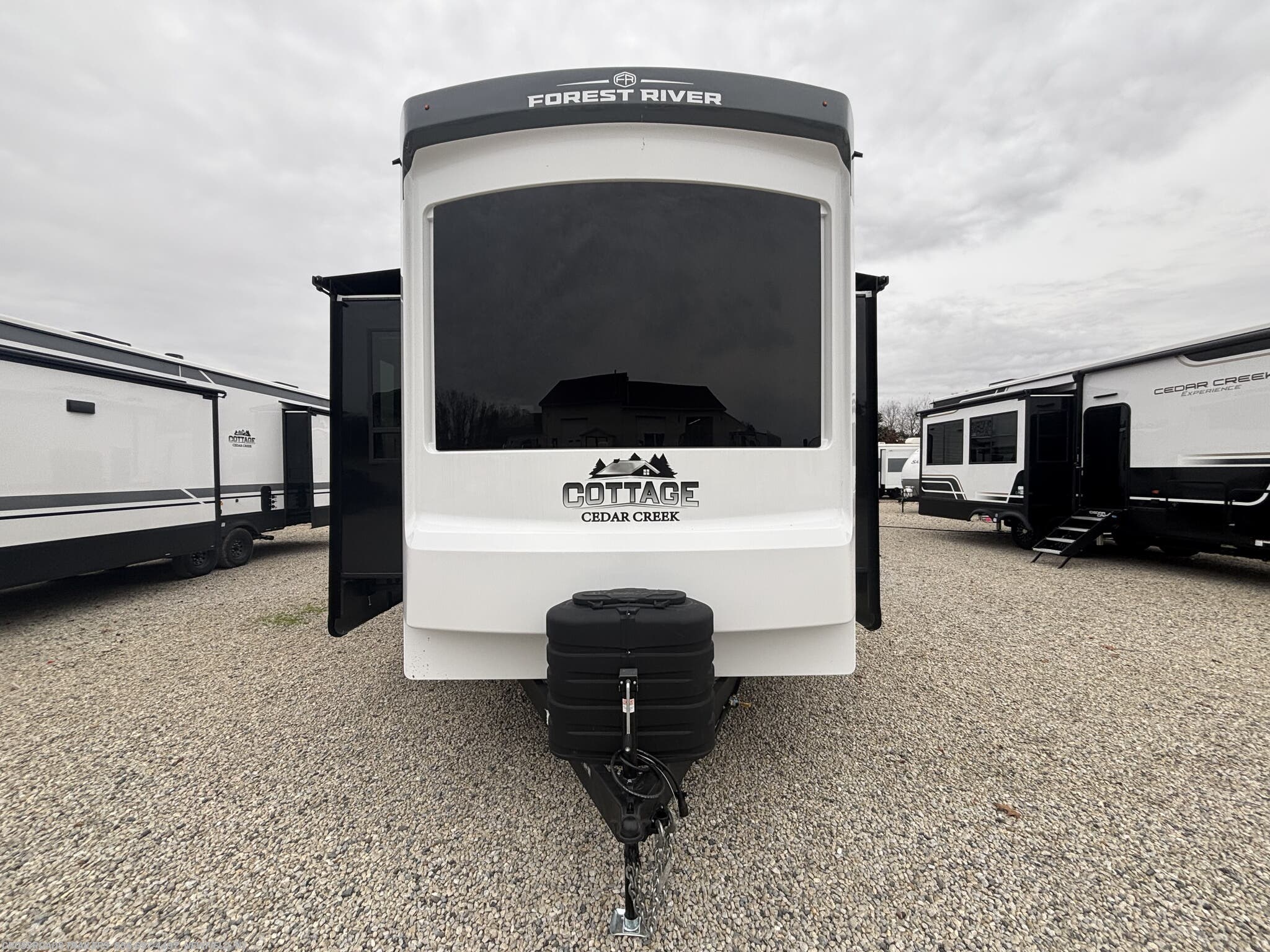 2026 Forest River Cedar Creek Cottage 40CDL - New Destination Trailer For Sale by Crossroads Trailer Sales, Inc. in Newfield, New Jersey features Leveling Jacks, Theater Seating, Washer, Awning, Oven