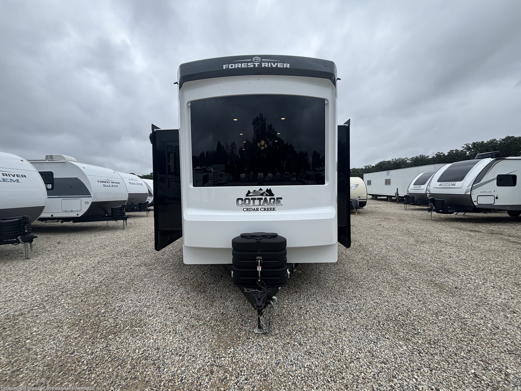 2026 Forest River Cedar Creek Cottage 40CCK - New Travel Trailer For Sale by Crossroads Trailer Sales, Inc. in Newfield, New Jersey features Propane, Leveling Jacks, Smoke Detector, LP Detector, Refrigerator