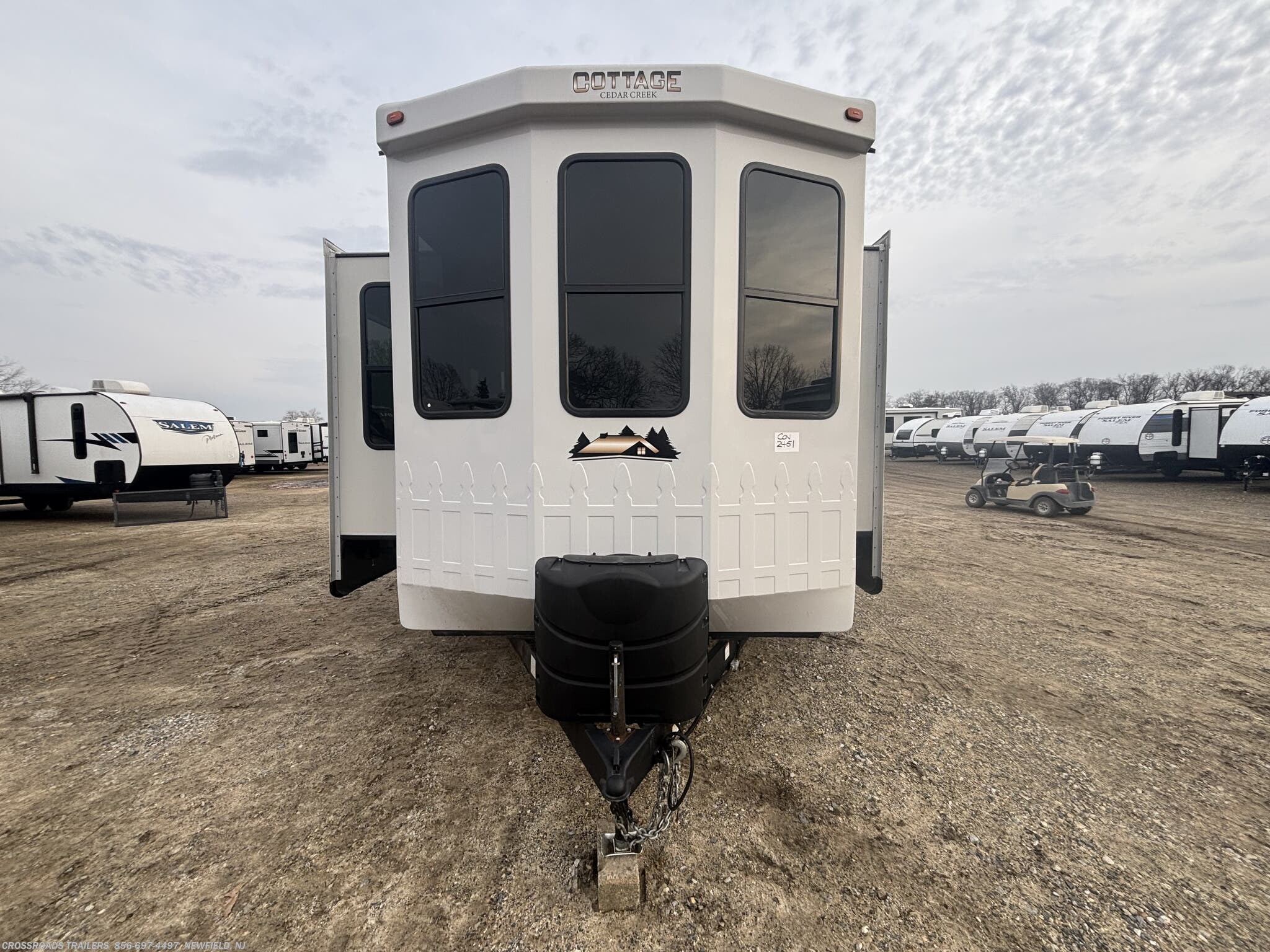 2023 Forest River Cedar Creek Cottage 40CCK - Used Destination Trailer For Sale by Crossroads Trailer Sales, Inc. in Newfield, New Jersey features Power Awning, Furnace, TV Antenna, Microwave, CO Detector