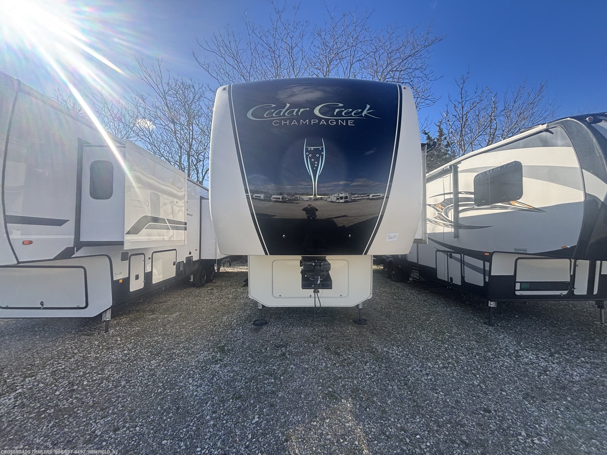 2019 Forest River Cedar Creek Champagne Edition 38EL - Used Fifth Wheel For Sale by Crossroads Trailer Sales, Inc. in Newfield, New Jersey features Hide-A-Bed, Theater Seating, Washer, Create-a-Breeze Fan, Inverter