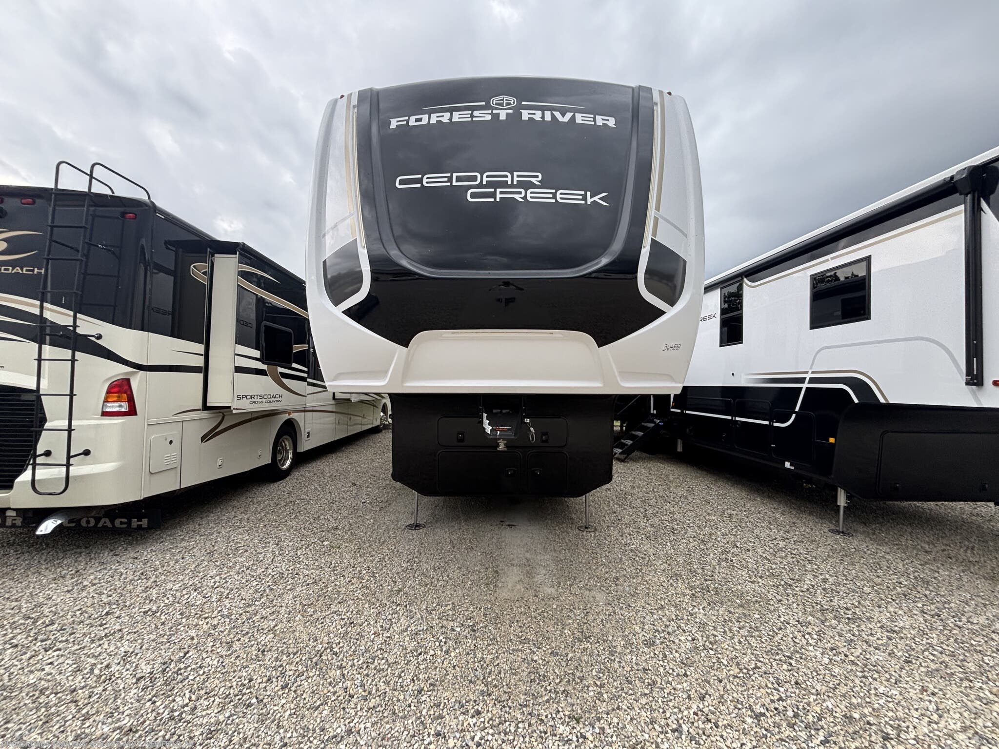 2027 Forest River Cedar Creek 383FB - New Fifth Wheel For Sale by Crossroads Trailer Sales, Inc. in Newfield, New Jersey features Solar Panel, Slideout, Leveling Jacks, Air Conditioning, CO Detector