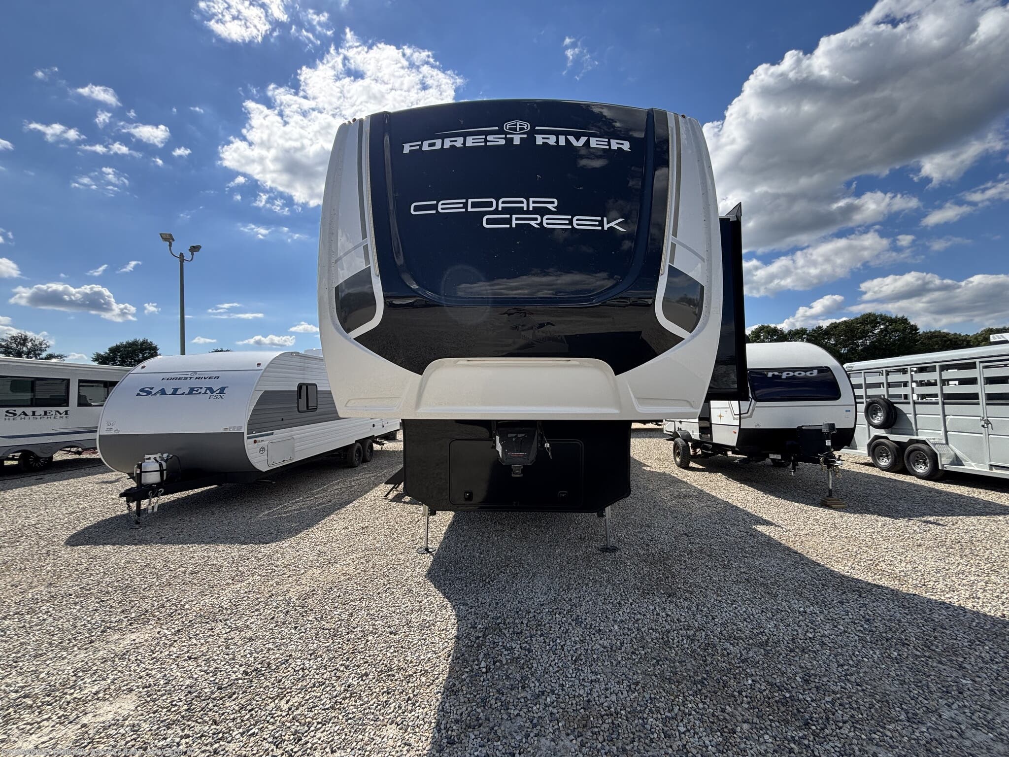 2026 Forest River Cedar Creek 38DB - New Fifth Wheel For Sale by Crossroads Trailer Sales, Inc. in Newfield, New Jersey features Awning, Hide-A-Bed, Theater Seating, Vanity, Black Tank Flush