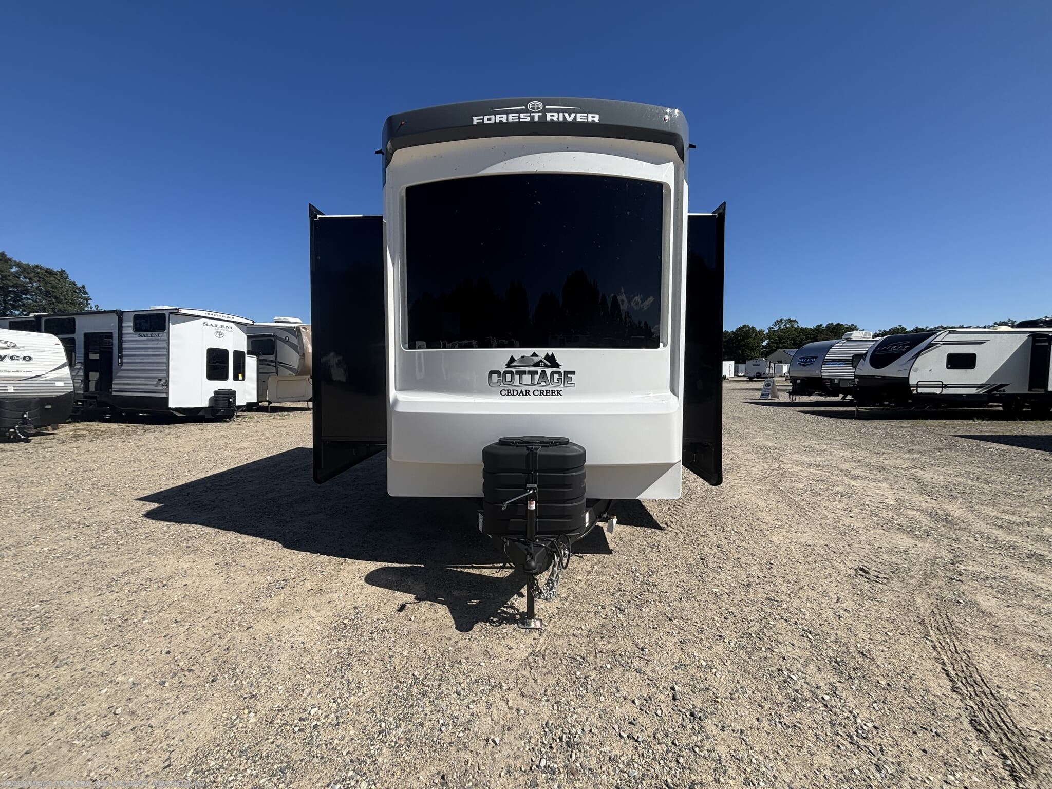 2027 Forest River Cedar Creek Cottage 40CMK - New Destination Trailer For Sale by Crossroads Trailer Sales, Inc. in Newfield, New Jersey features Dryer, 50 Amp Service, Batteries, LP Detector, Washer