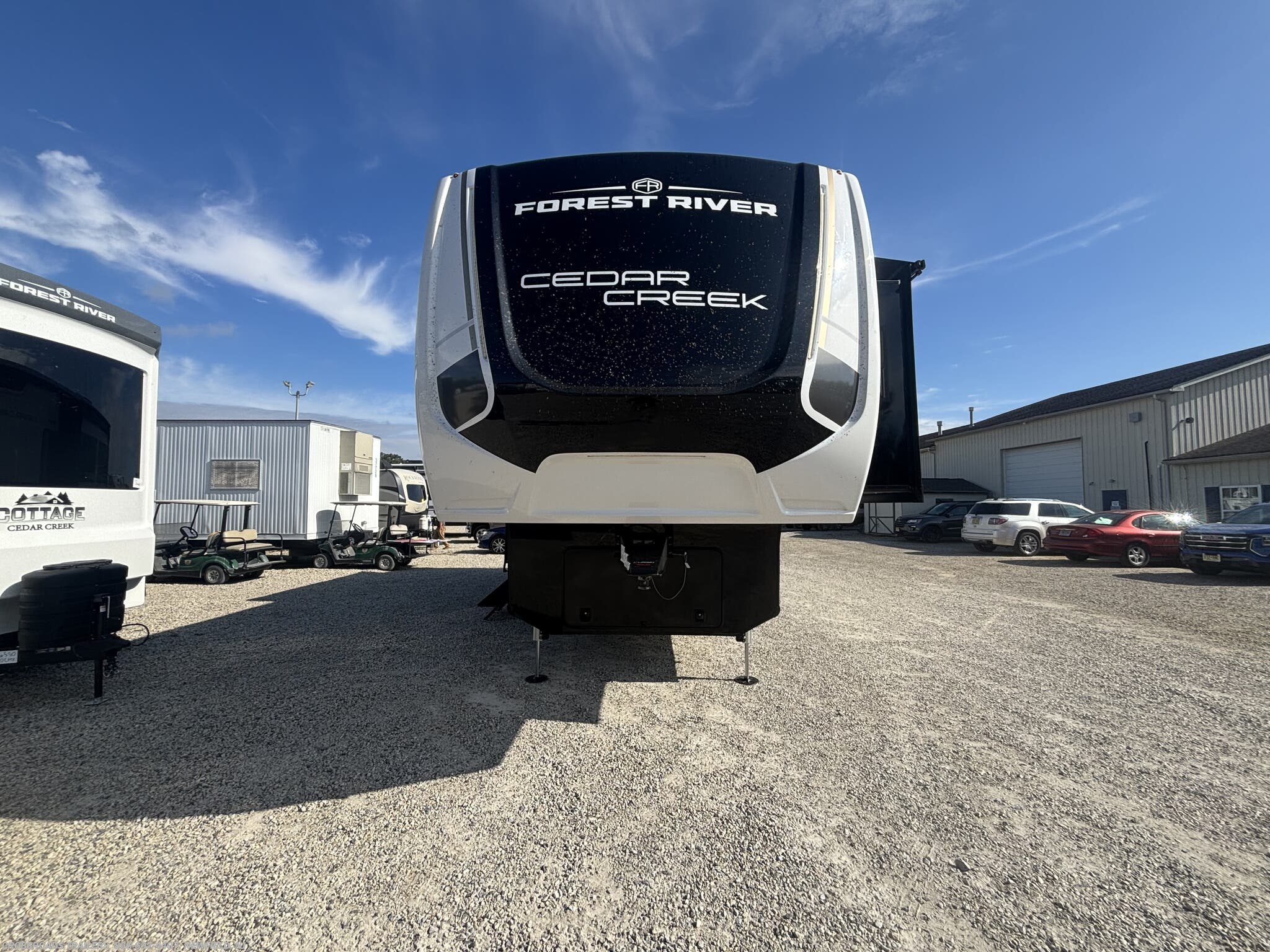 2027 Forest River Cedar Creek 290RL - New Fifth Wheel For Sale by Crossroads Trailer Sales, Inc. in Newfield, New Jersey features Dryer, Fire Extinguisher, Hide-A-Bed, Refrigerator, Power Awning