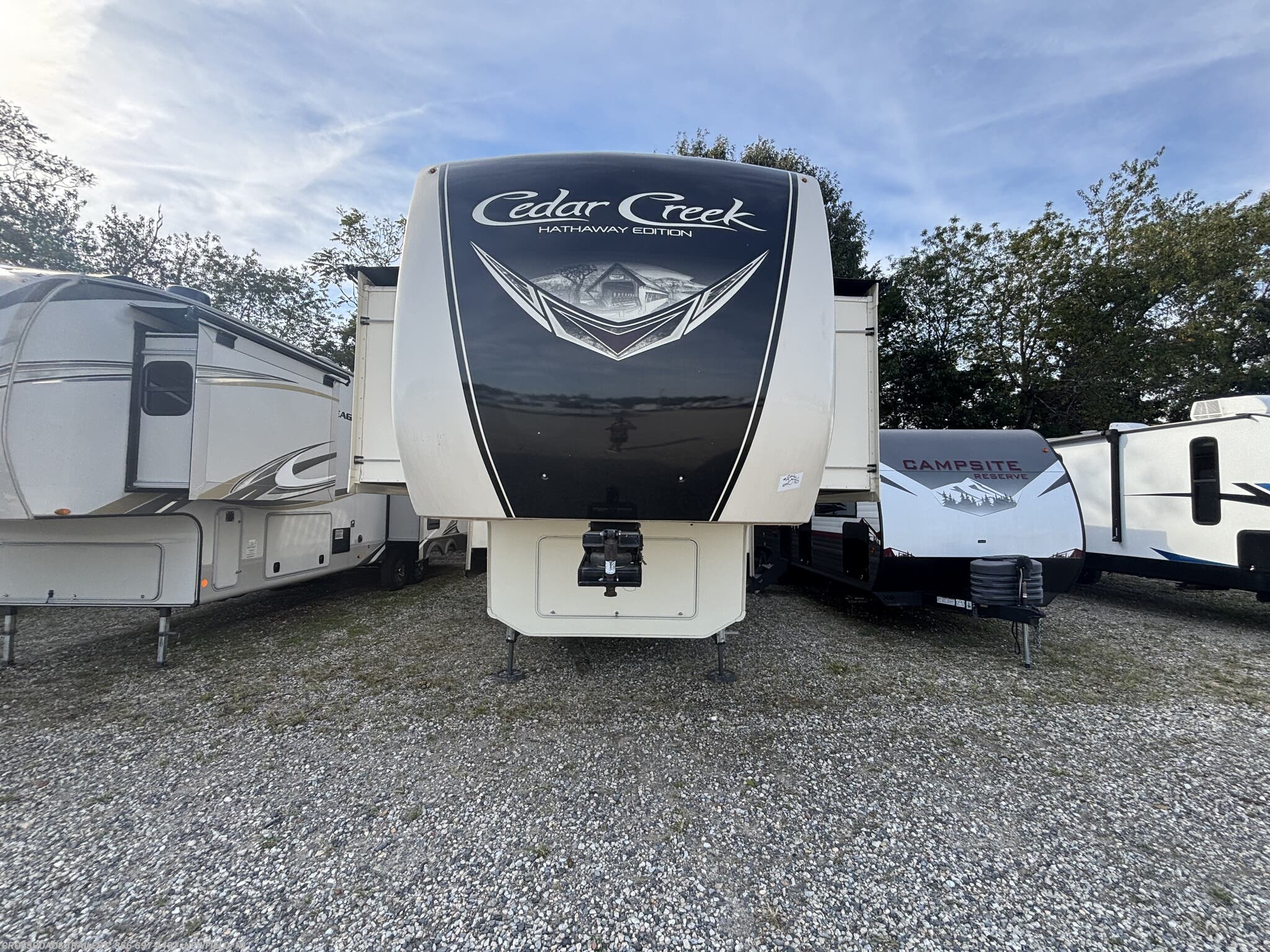 2019 Forest River Cedar Creek Hathaway Edition 38FLX - Used Fifth Wheel For Sale by Crossroads Trailer Sales, Inc. in Newfield, New Jersey features TV, Sound Bar, Awning, 50 Amp Service, Washer